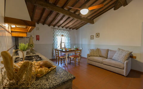 Accommodation Montelopio 7: Dining Room, Kitchen, Living Room