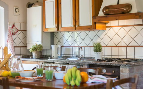 Accommodation Montelopio 4: Dining Room, Kitchen, Living Room