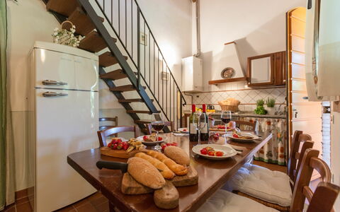 Accommodation Montelopio 5: Dining Room, Kitchen, Living Room