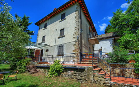 Accommodation Rustico: Building Exterior, Garden