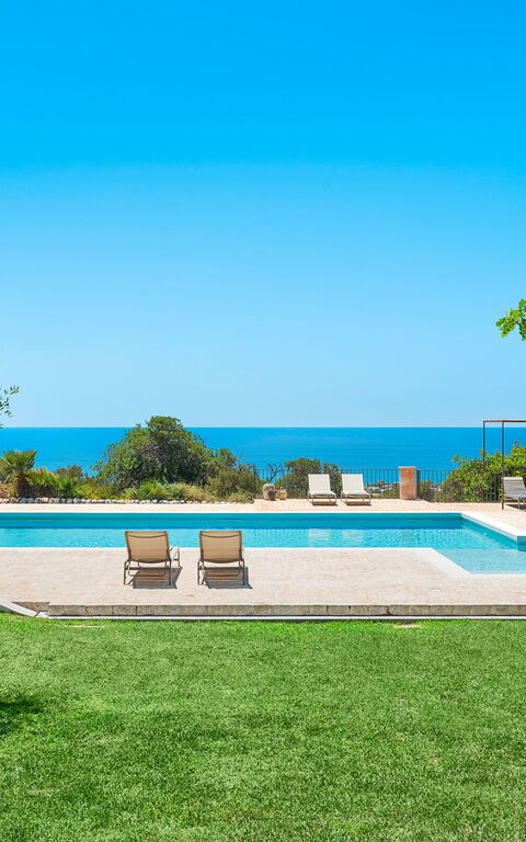 Isla Verde: Building Exterior, Garden, Outdoor, Pool, Scenic View