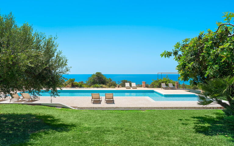 Isla Verde: Building Exterior, Garden, Outdoor, Pool, Scenic View