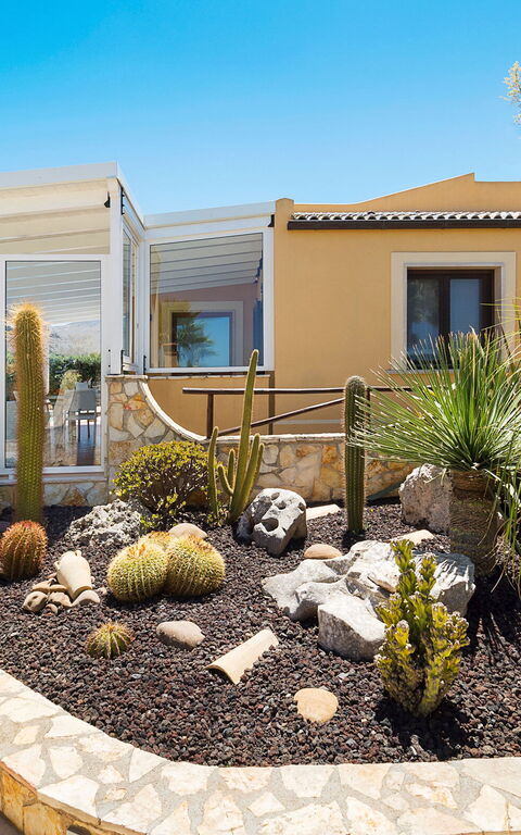 Afrodite: Building Exterior, Garden