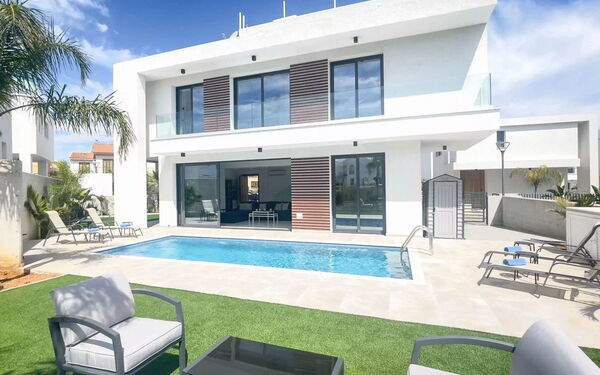 By the Beach - Royal Sapphire Villa: Building Exterior, Garden, Outdoor, Pool