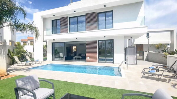 By the Beach - Royal Sapphire Villa: Building Exterior, Garden, Outdoor, Pool