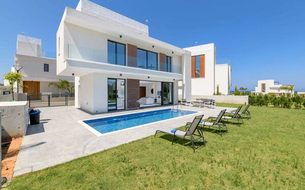 By the Beach - White Coral Villa: Building Exterior, Garden, Outdoor, Pool