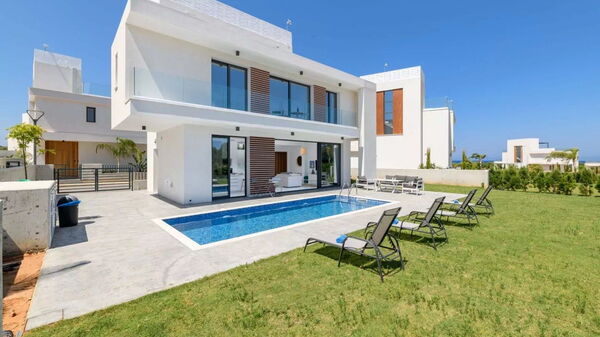 By the Beach - White Coral Villa: Building Exterior, Garden, Outdoor, Pool