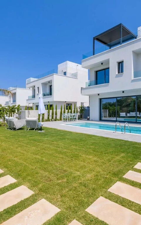 By the Beach - Blue Topaz Villa: Building Exterior, Garden, Outdoor, Pool